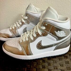 Air Jordan 1 Mid SE 
Women's High-Top Sneakers - White and Silver